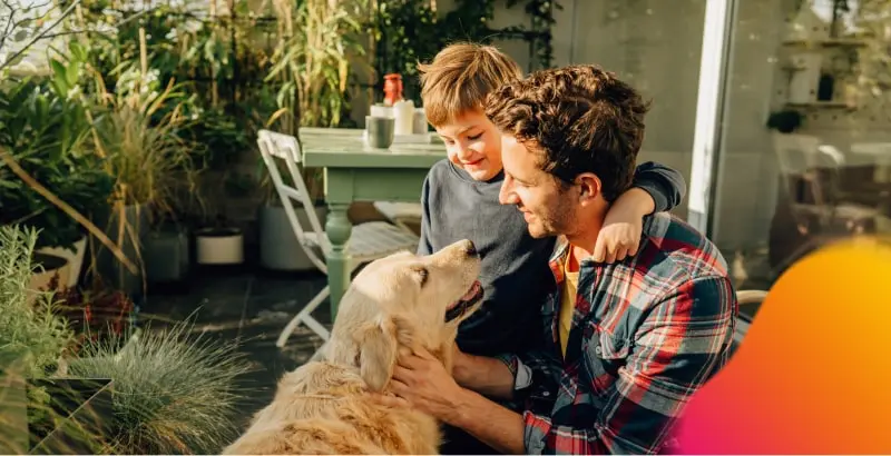 Father and son with dog